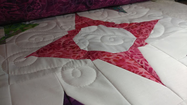 Free motion quilting my improv stars quilt