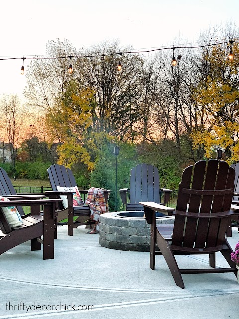 Circle fire pit with chairs on patio