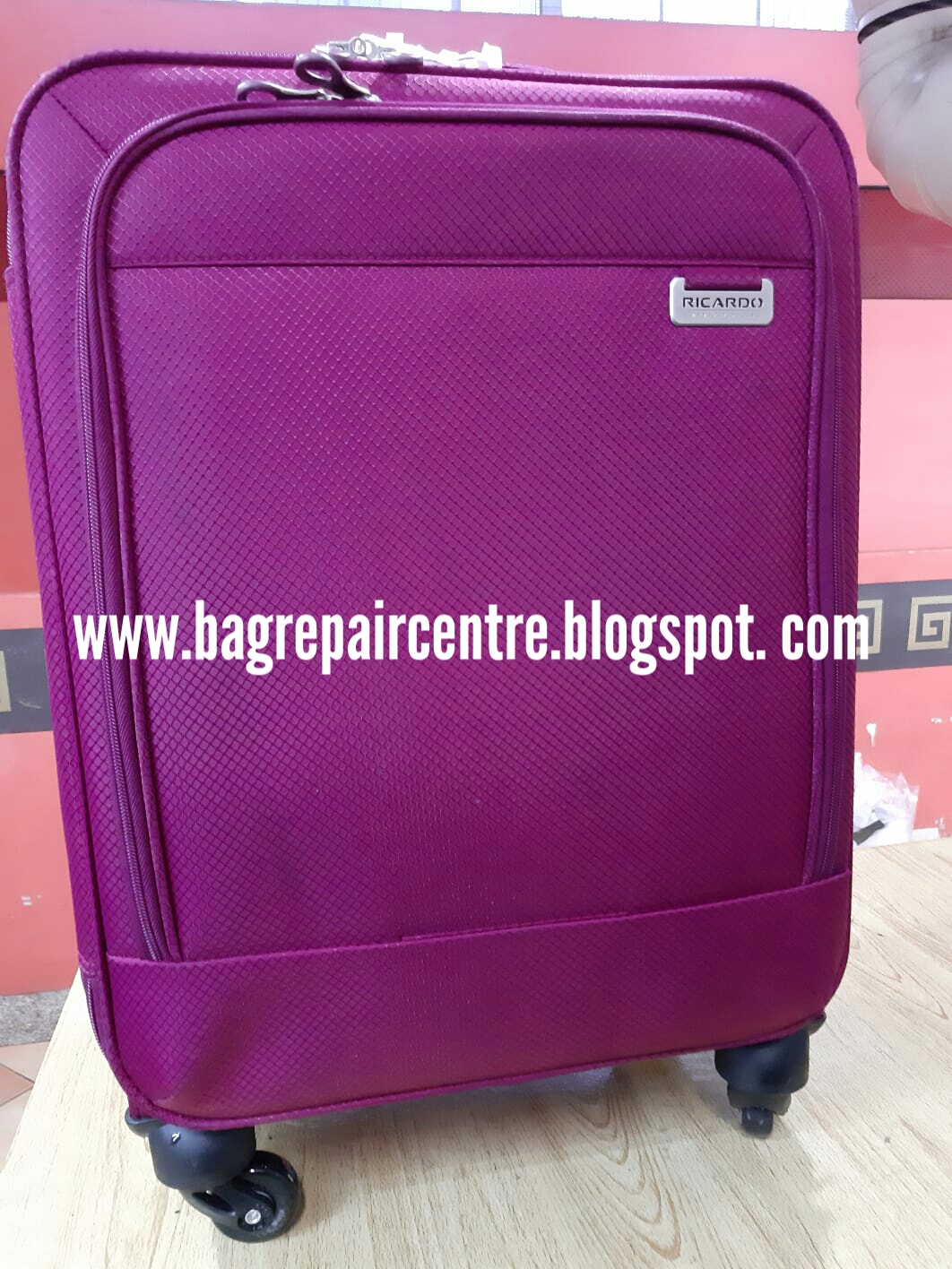 slazenger luggage wheel replacement