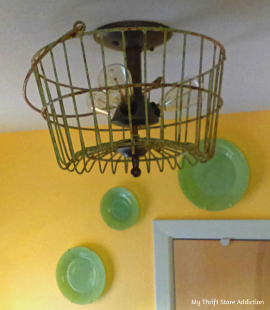 Repurpose a farmhouse style basket to give an instant upgrade to a dated light fixture! DIY farmhouse light fixture upgrade