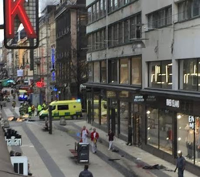 999 Truck ploughs into shop in busy Stockholm street, killing at least three and causing injury to many others