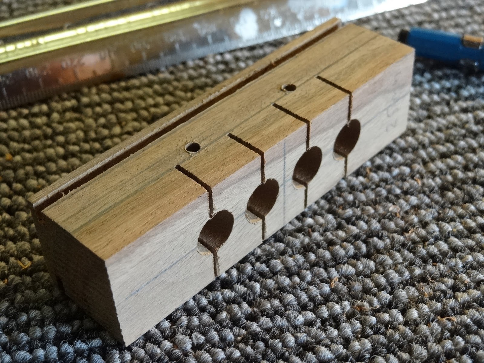 Shonky How to make an easy string Ukulele Bridge.