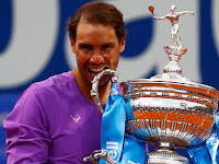 Rafael Nadal battles past Stefanos Tsitsipas for 12th Barcelona Open title.