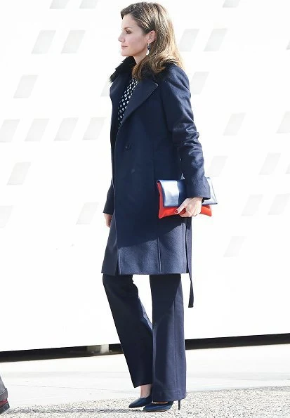 Queen Letizia wore Carolina Herrera blouse and Hugo Boss suit
