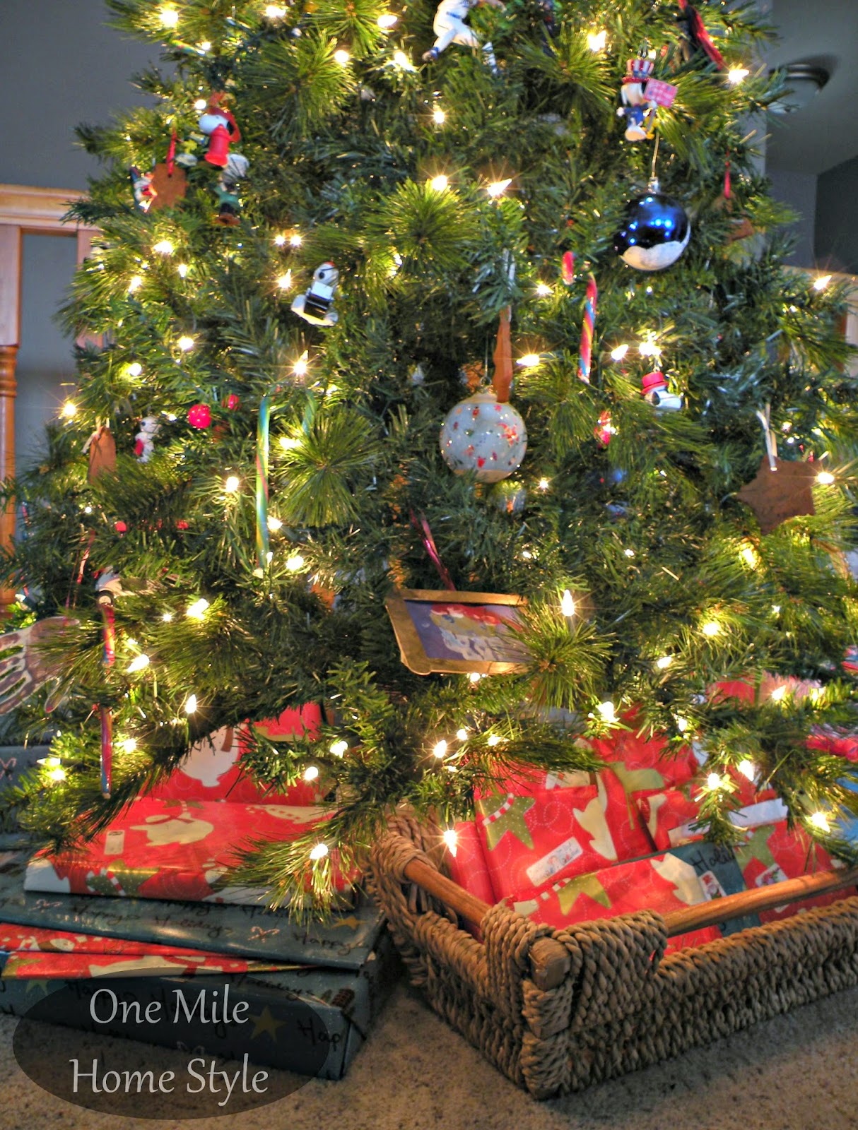 One Mile Home Style Christmas Tree 2014 - Using a basket to hold small gifts under the tree