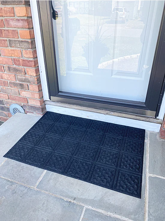 outdoor mat repainted on the front stoop