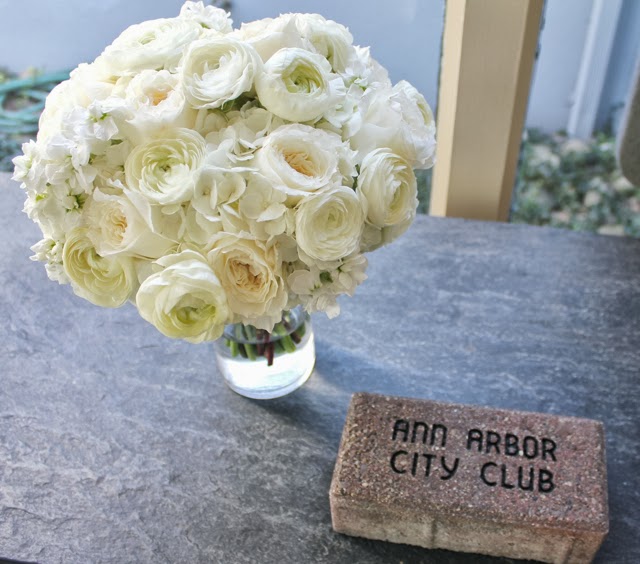 all white brides bouquet white ranunculus garden roses david austin patience hydrangea and stock flower mounded textured audrey hepburn classic elegant Ann Arbor Detroit wedding flowers sweet pea floral design the ann arbor city club