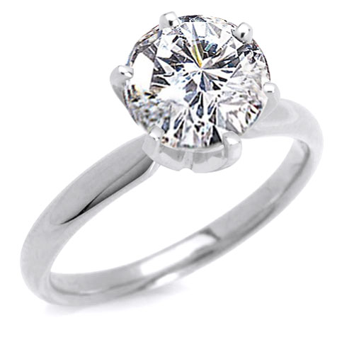 Two Golden Rings: 2 carat diamond ring