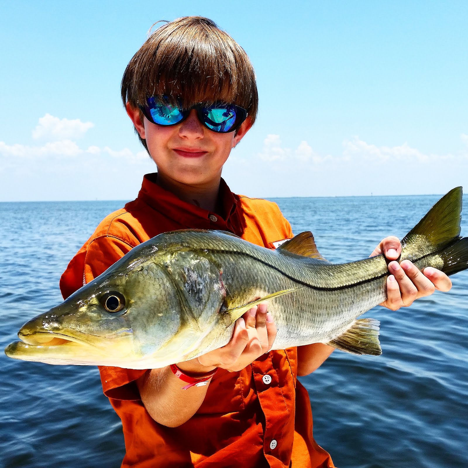 Happy Young Angler with Snook