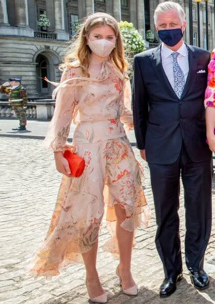 Queen Mathilde wore a new fuchsia dress by Dries Van Noten. Princess Elisabeth, Prince Gabriel, Princess Eleonore, and Princess Astrid