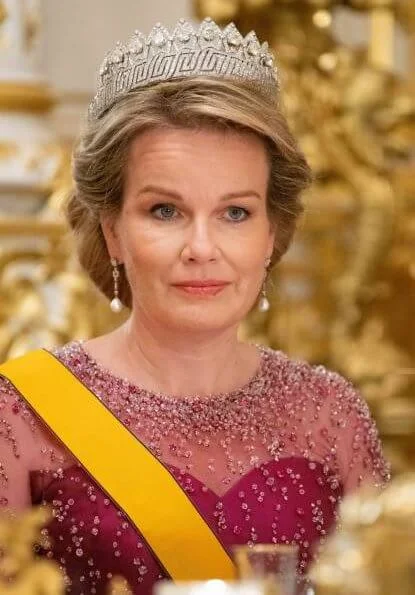 Queen Mathilde diamond tiara, Maria Teresa diamond earrings, Princess Stephanie diamond tiara onyx. Mathilde fuchsia gown