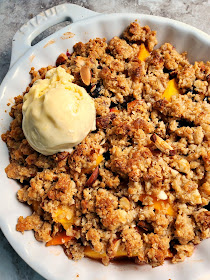 Peach Blueberry & Ginger Crisp:  Nothing tastes more like summer than juicy sweet peaches with bursts of tart blueberries laced with ginger, all topped with a crunchy buttery topping. - Slice of Southern