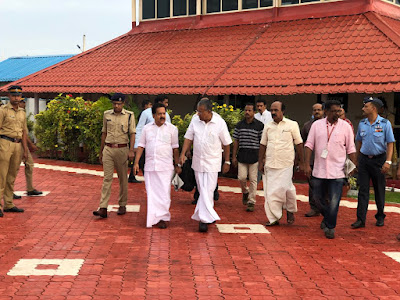 Kerala CM pinarai Vijayan and Opposition leader ramesh chennithala during kerala floods