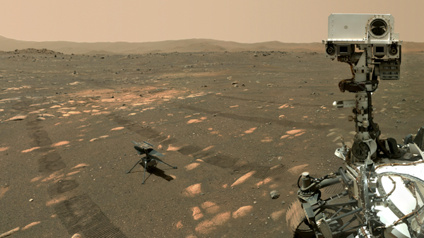 Using a camera on its robotic arm, the Perseverance Mars rover took this selfie with the Ingenuity Mars helicopter next to it...on April 6, 2021. Using a camera on its robotic arm, the Perseverance Mars rover took this selfie with the Ingenuity Mars helicopter next to it...on April 6, 2021.