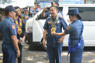 PNP Officers receiving a Philippine-flag inspired rosette leis Philippine National Police Officers receiving a Philippine-flag inspired rosette leis in Pasay City, Metro Manila, Philippines