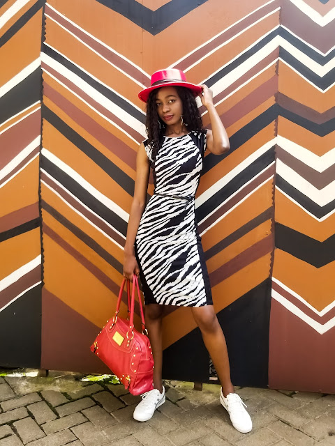 How To Wear A Zebra Print Dress With White Sneakers