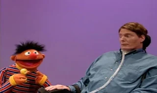 Ernie is there with his good friend Christopher Reeve and Rubber Ducky. Sesame Street Episode 4071