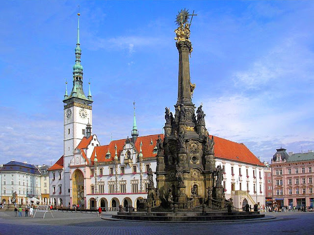 Olomouc's Town Hall  Square with the Plague Monument in the foreground. Photo: WikiMedia.org.