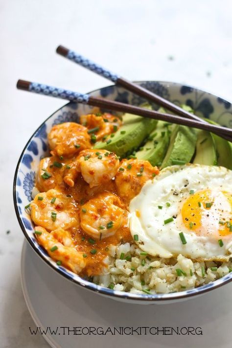 A delicious Paleo-Whole 30 Spicy Shrimp Cauliflower Rice Bowl with fried egg and avocado made in 15 minutes!