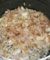 Frying onions till light brown for chicken curry recipe