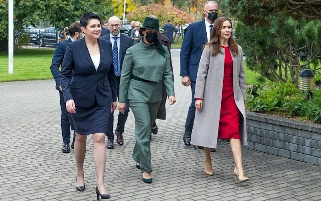 Crown Princess Mary a red contrast-stitch cady dress from Dolce & Gabbana, and double cashmere oslo coat from Joseph