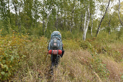 Sonya Richmond bushwhacking Trans Canada Trail Manitoba.