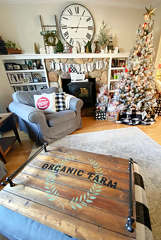 Table top on ottoman in living room with Christmas tree