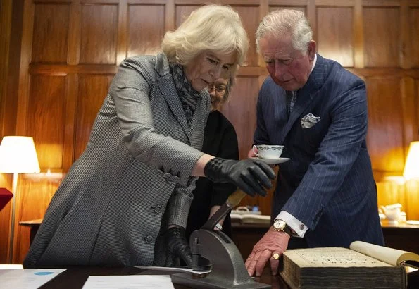 Duchess Camilla wearing her bespoke grey coat dress