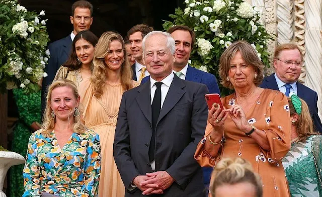 Princess Marie Astrid wore the Kinsky Honeysuckle tiara from the collection of the Princely Family of Liechtenstein. Wedding dress