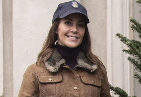Princess Marie wore  a fur trim utility jacket from Barbour. Princess Athena wore a navy blue puffer piping jacket from Zara