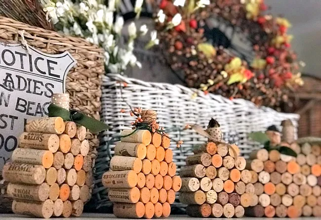 Wine cork pumpkins on shelf with baskets