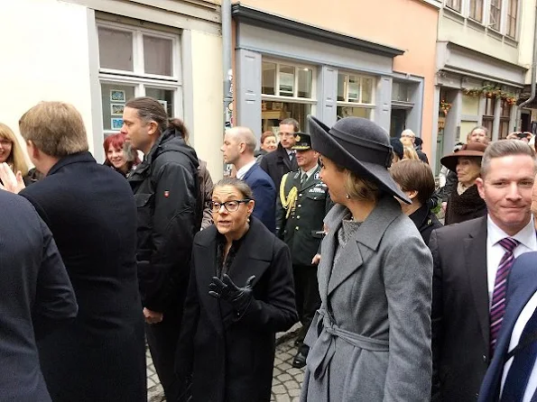 Queen Maxima wore  Natan coat and dress, Christian Louboutin grey suede toe pumps, Chanel Grey caviar leather coco bags