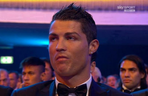 caption-this-cristiano-ronaldo-s-unhappy-face-at-messi-winning-ballon