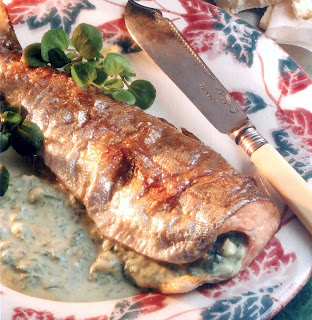 Traditional recipe for a grilled trout served with watercress sauce and a watercress garnish