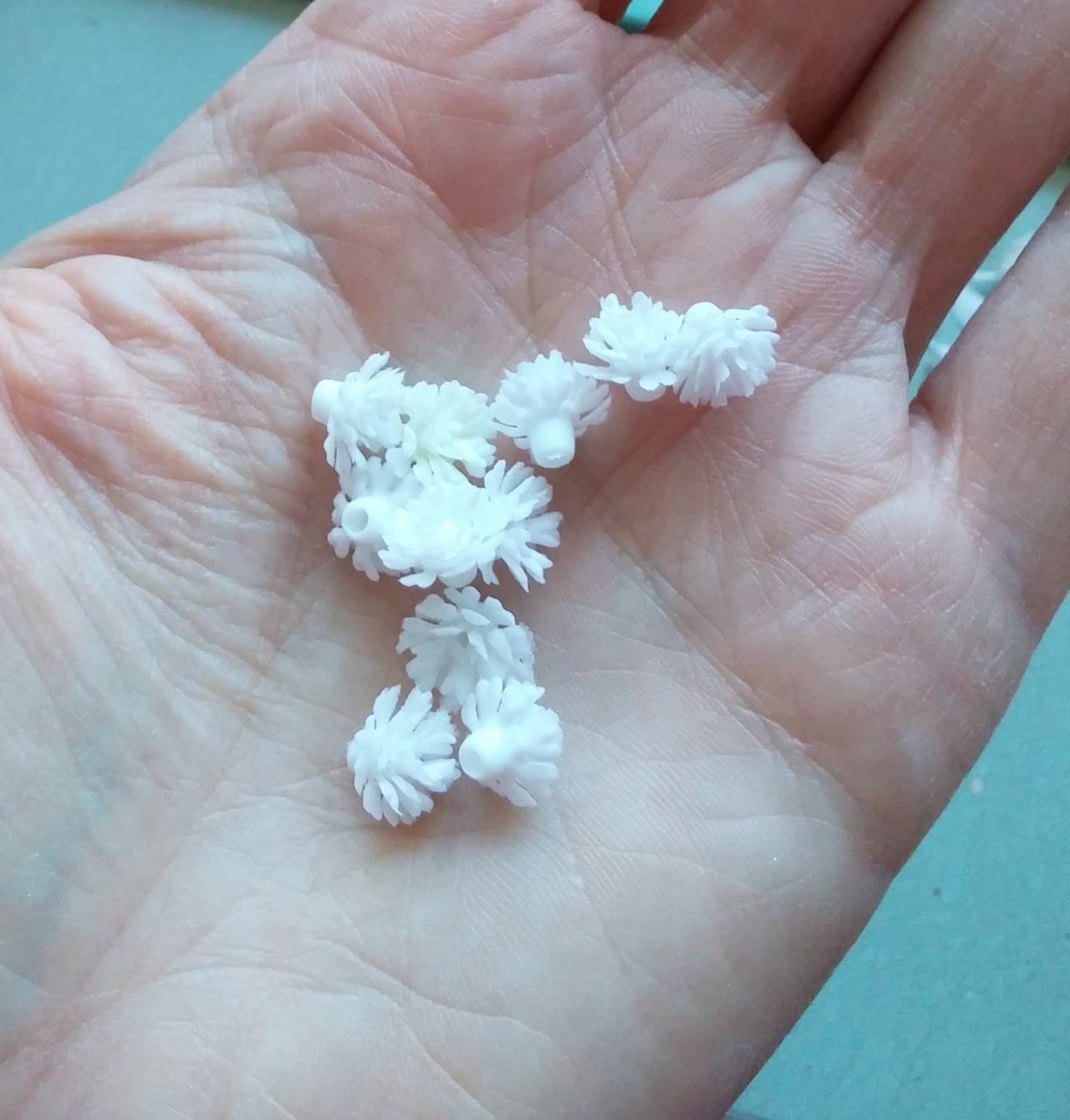tiny plastic flowers