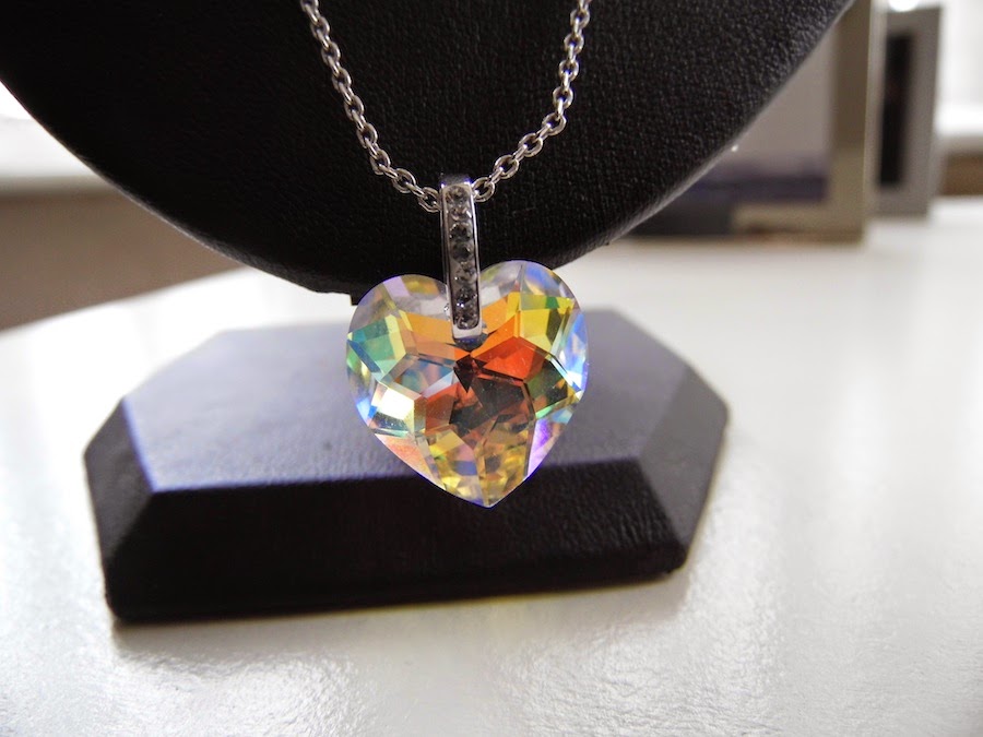 Two boxed Warren James Swarovski crystal heart pendant necklaces, largest  chain L: 40 cm and a brace