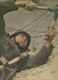 Cutting the wires color photos of World War II worldwartwo.filminspector.com