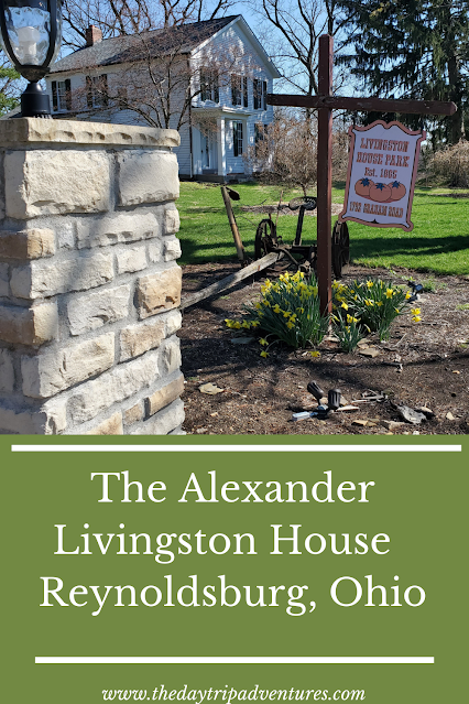Front View of the Alexander Livingston Historical Home and Park with Sign