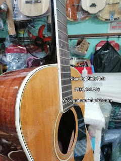 Địa chỉ thay dây đàn, chỉnh rè, dán thùng đàn guitar tphcm