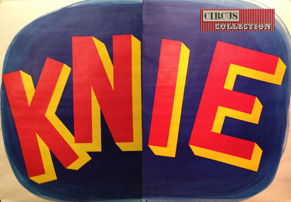 lettrage de Knie en jaune et rouge sur fond bleu foncé
