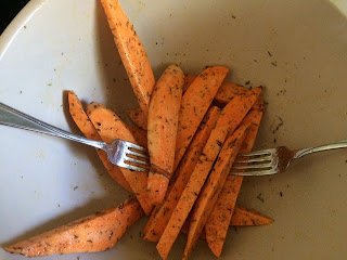 sliced sweet potatoes tossed with oil and spices