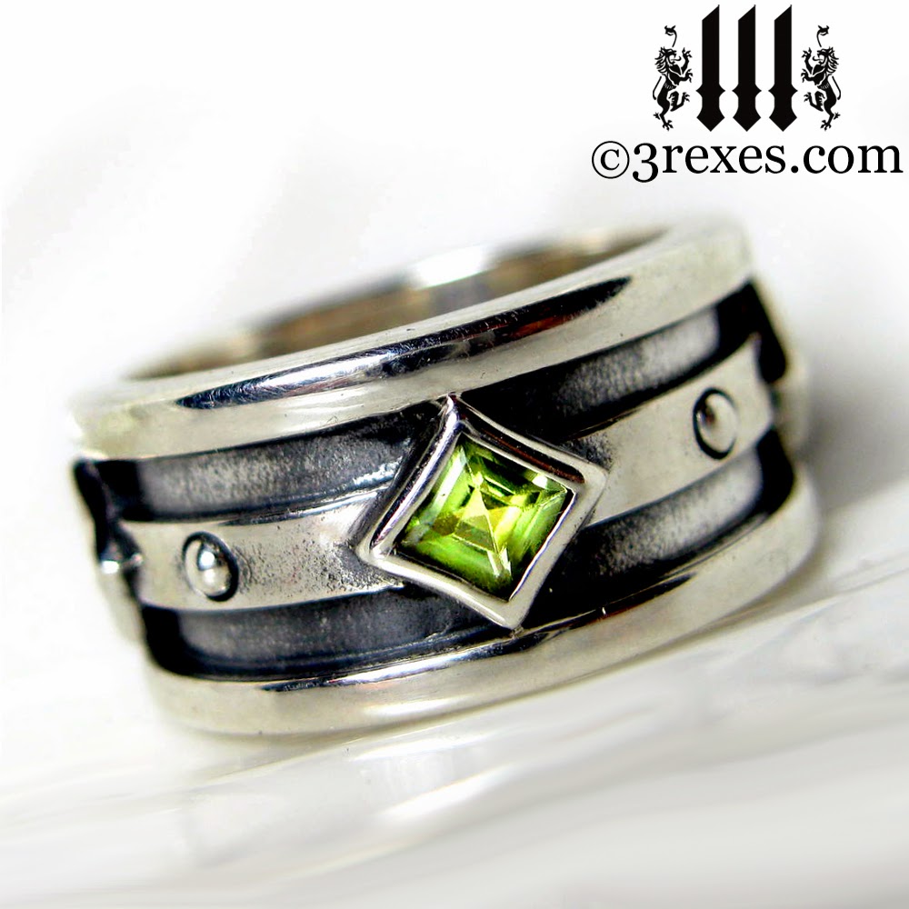 mens silver gothic engagement ring with green peridot