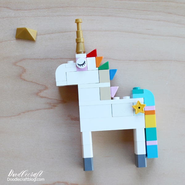 Lego pieces needed to build the most epic Lego Unicorn with a rainbow colored mane, gold tiara and horn, rainbow colored waterfall tail and star cutie mark on the flank!