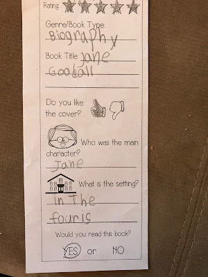 A blog post with a FREEBIE about doing a book tasting for with first graders. Encourage your first grade students to experience various reading genres by having a book tasting. Students sample books in various genres in a cafe themed setting. Link provided to free reading genre posters. {1st grade, ELA, balanced literacy}