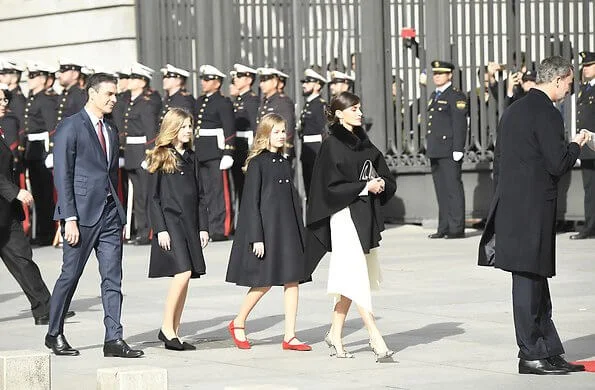 Queen Letizia, Princess Leonor and Infanta Sofía attended the Solemn opening of the Spanish Parliament. Carolina Herrera cape and dress