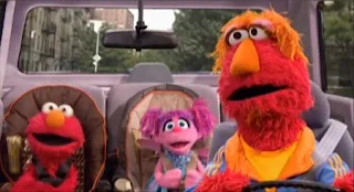 Elmo's father Louie is traveling together with Elmo and Abby Cadabby. Sesame Street Elmo's Travel Songs and Games