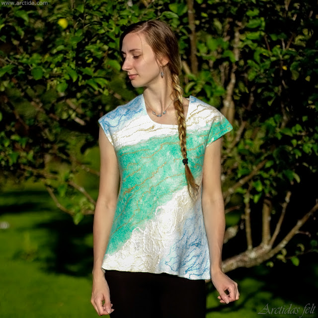 https://www.arctida.com/en/home/153-nuno-felted-top-merino-wool-and-silk-top-in-sky-blue-and-mint-green-wearable-art-clothing.html