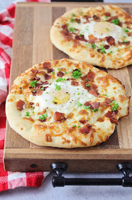 These mini bacon breakfast pizzas are so delicious and flavorful, and perfect for breakfast, lunch, or dinner!