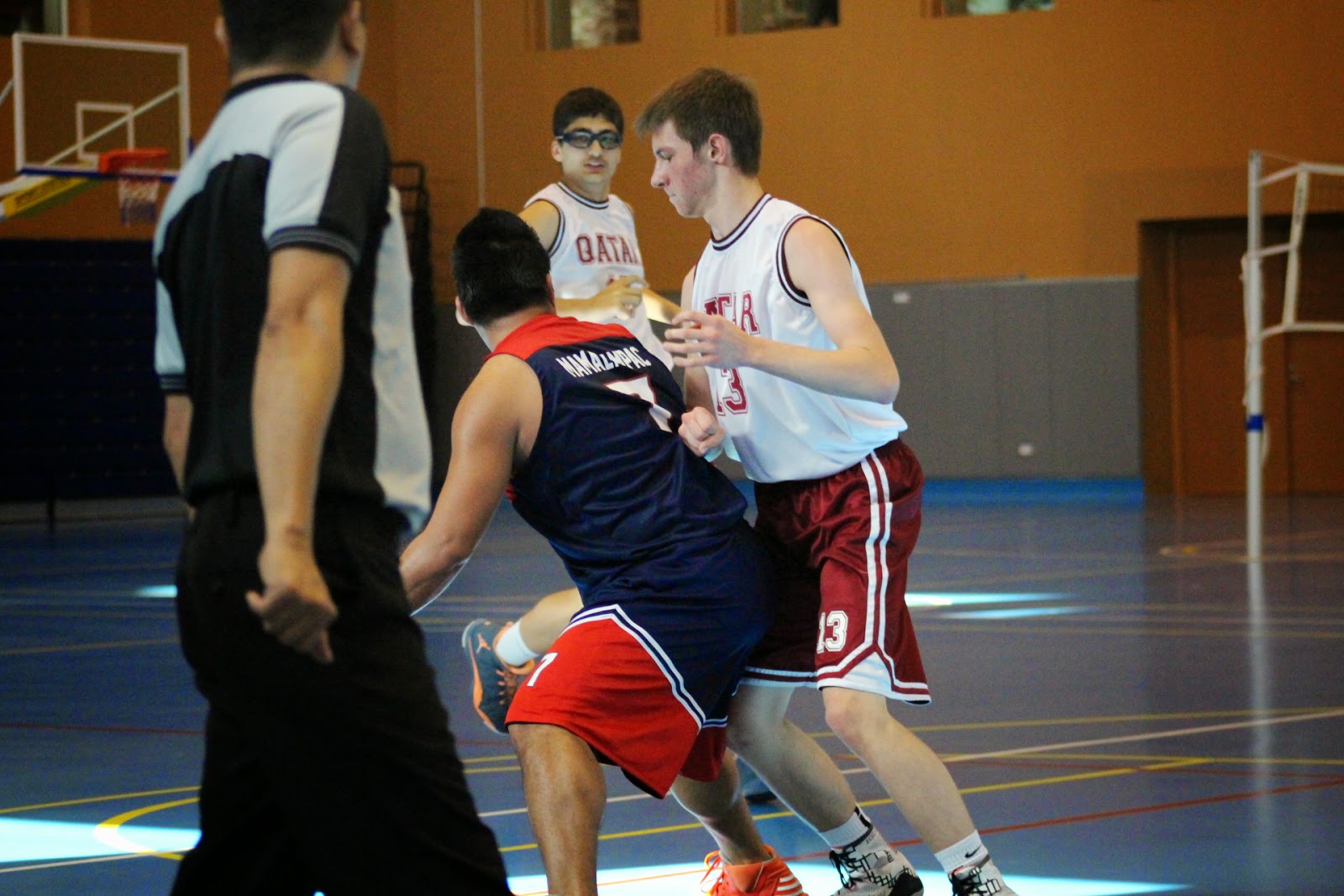 Chutes in Qatar Varsity Basketball