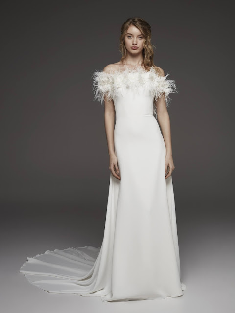HALDA - elegance and solemnity of feathers are the inspiration for this spectacular dress, with a flared silhouette, made in crepe Monique with floral appliqués K'Mich Weddings - wedding planning - wedding dresses - halda - pronovias - fall 2019 collection